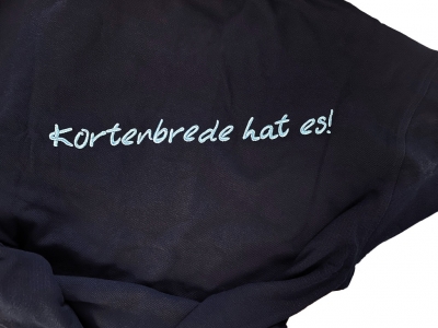 Arbeitskleidung Veredelung Münster Rückenbestickung Schrift Kortenbrede Slogan